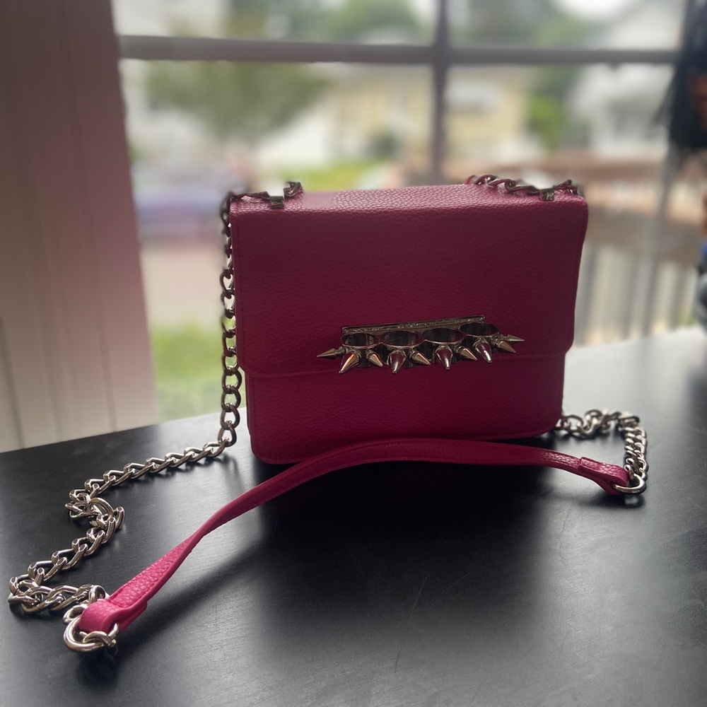 “Akira” brass knuckle cross body purse. Hot pink, removable strap.